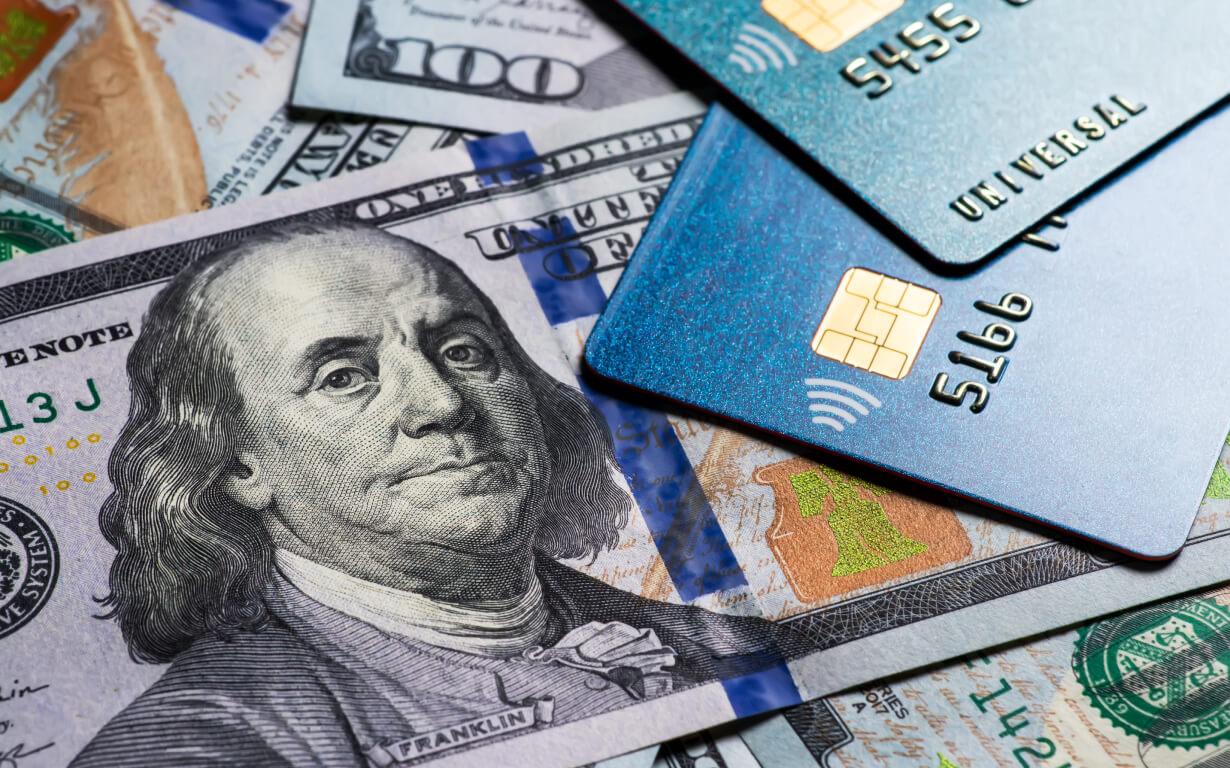 Credit and debit cards with cash.