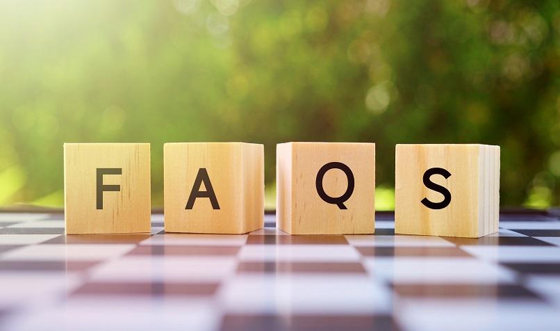 Wooden blocks spelling out FAQS