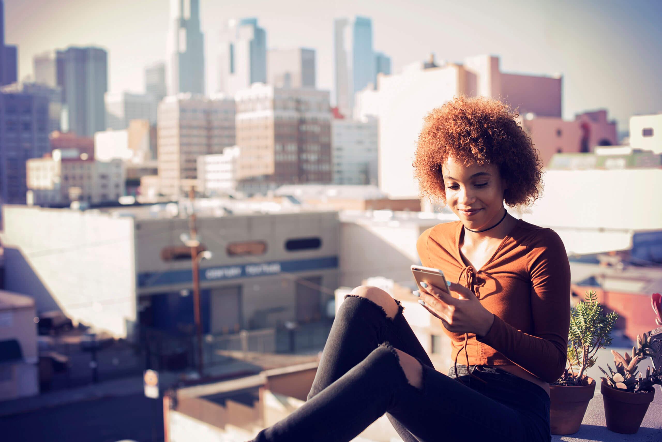 Woman in Los Angeles with a smartphone.